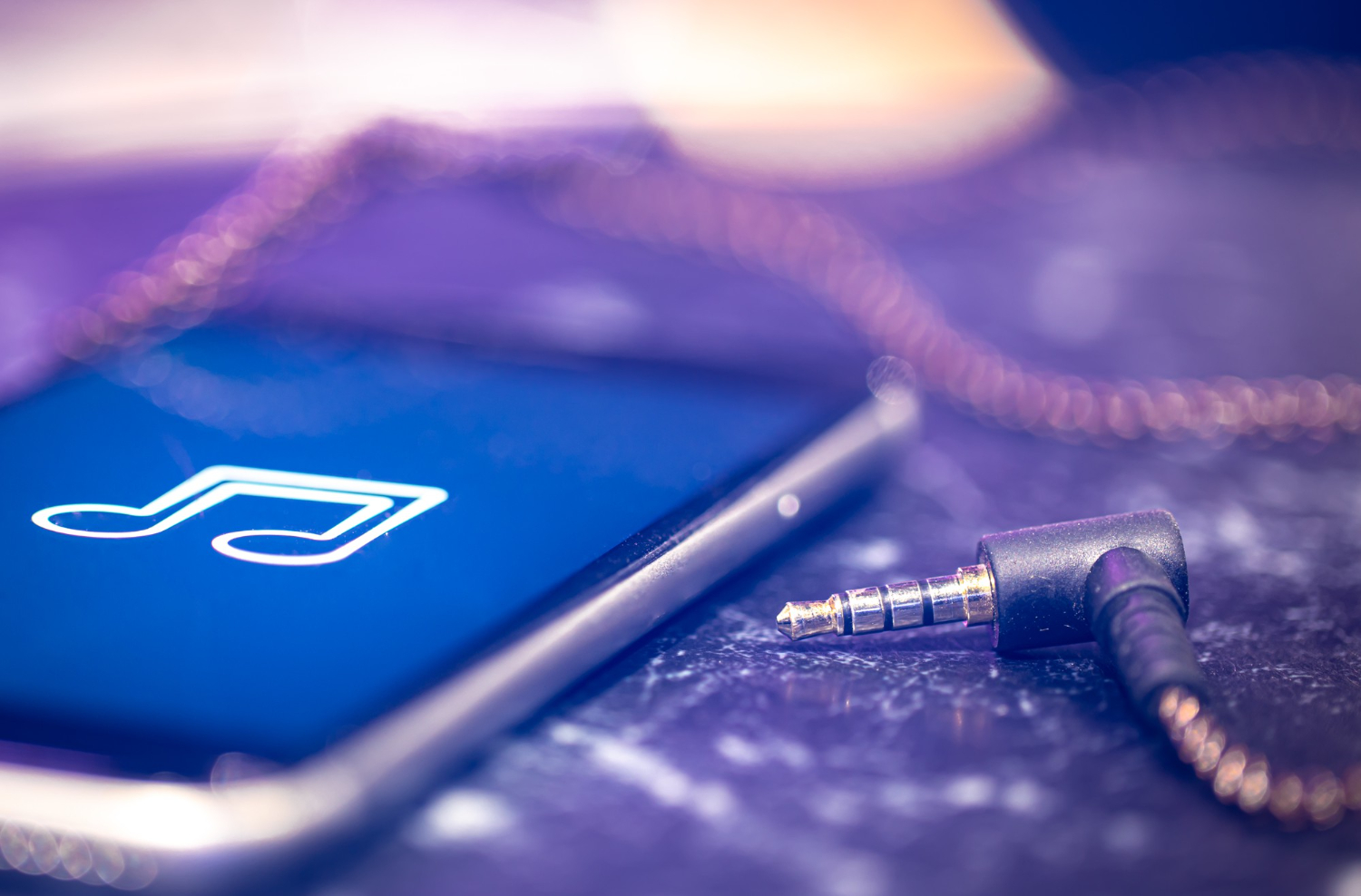 smartphone with blue screen and music logo on it
